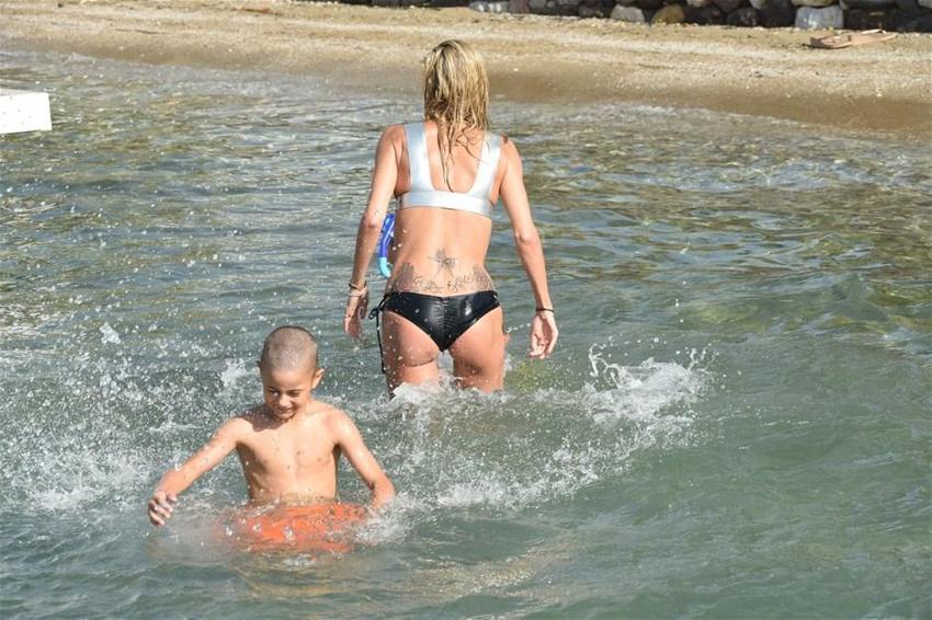 Kim der iki çocuk annesi!
