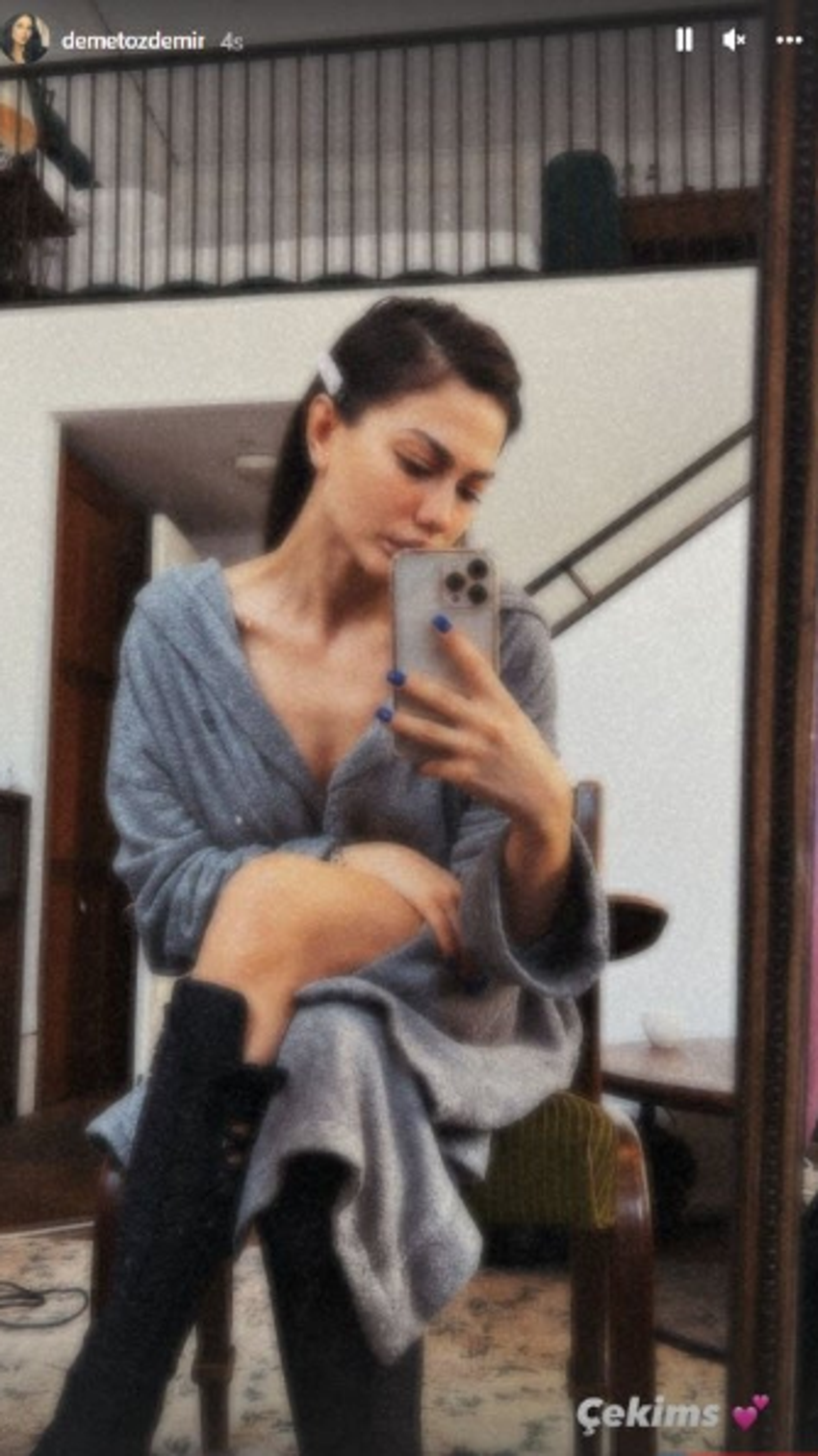 Demet Özdemir'den bornozlu dekolteli pozlar! 