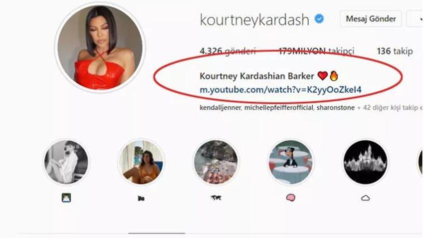 Kourtney Kardashian ve Travis Barker balayına çıktı! Elbiselerle denize atladılar...