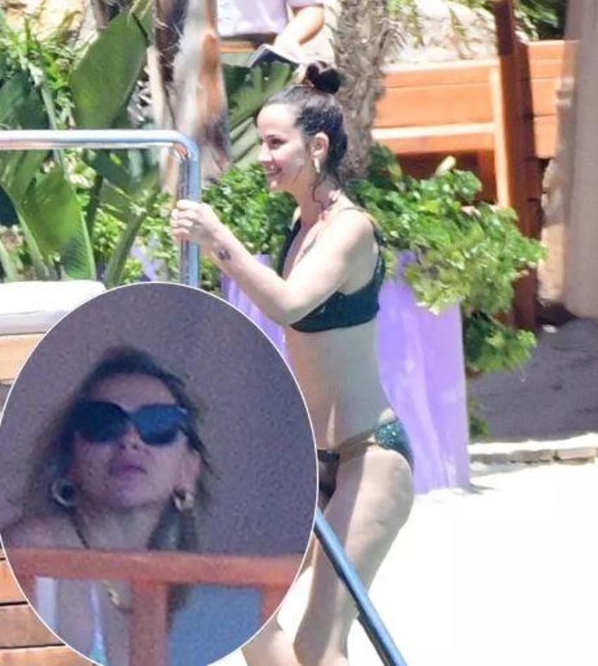 Hadise’nin güneşlendiği kabananın perdelerini örttü! Plajda önlem