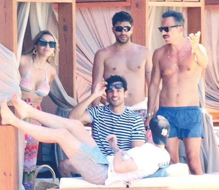 Hadise’nin güneşlendiği kabananın perdelerini örttü! Plajda önlem