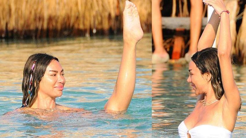 Oryantaldi şarkıcı oldu! Didem Kınalı fit haliyle tüm bakışları üzerine çekti: Denizde bale şov