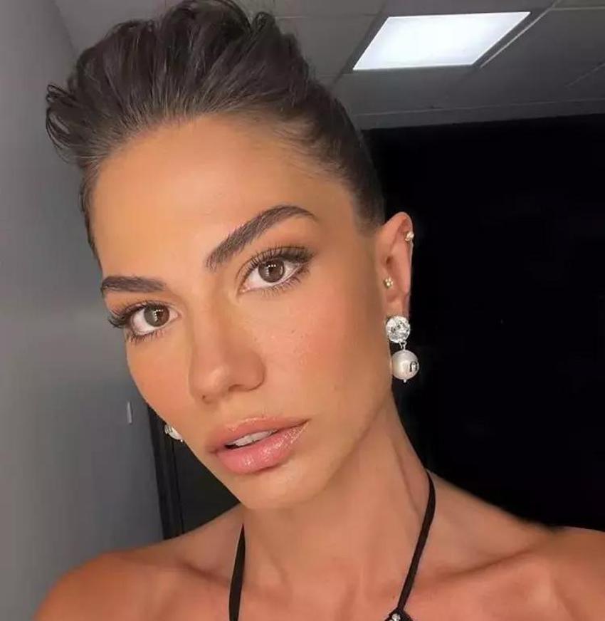 Oğuzhan Koç’tan ayrılan Demet Özdemir’den dekolteli cesur pozlar! Kombinin fiyatı dudak uçuklattı