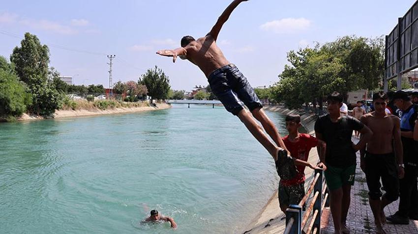 Adana polisi kanala giren çocuklara havuz sözü verdi