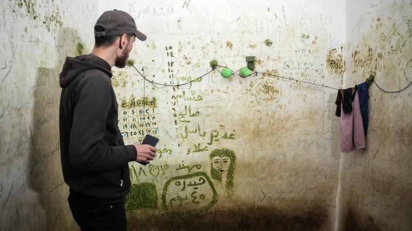 Suriye hapishanesinde kalan Hüssam Khatip isimli mahkum orada yaşadıklarını anlattı! Mahkumlar zeytinle hayatta kaldı, çekirdekleri ile duvara çentik attı