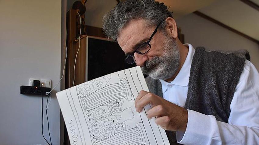 Trafik kazasında felç geçirdi, çizdiği karikatür onu hayata bağladı