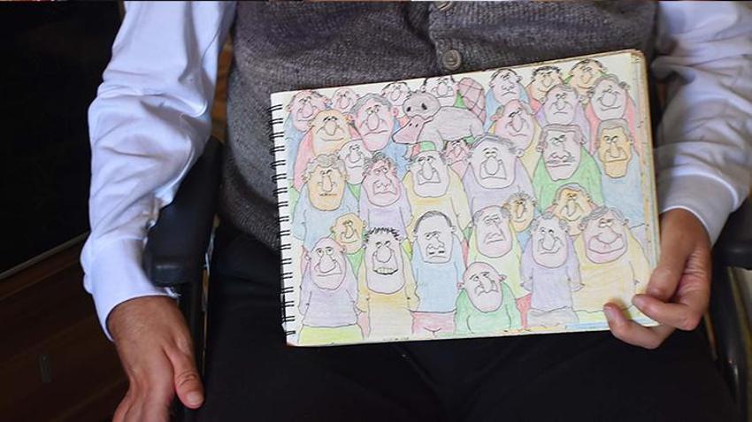 Trafik kazasında felç geçirdi, çizdiği karikatür onu hayata bağladı