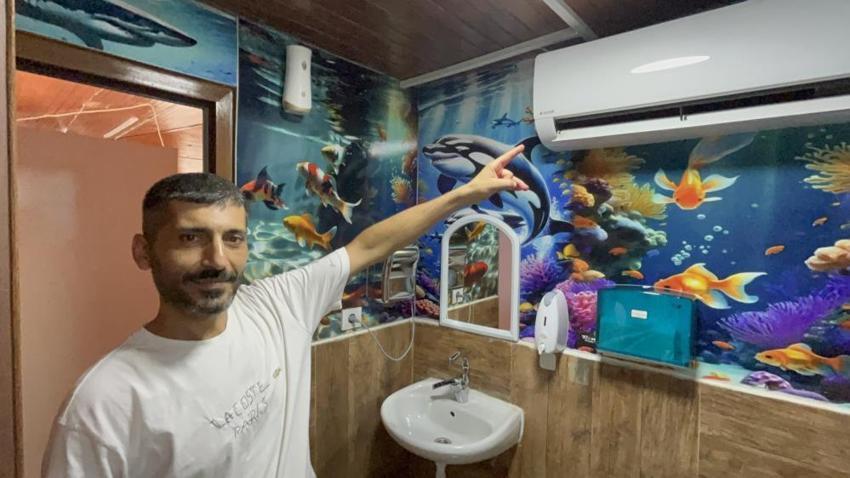 Hataylı esnaf müşterilerini serinletmek için 20 bin lira harcadı, pişman olmadı: 'İçerisi gerçekten rahatlama kapısı gibi!'