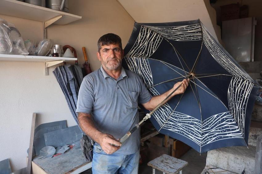 Hatay'da etkili olan şiddetli yağışlar sadece bir esnafın işlerini artırdı!