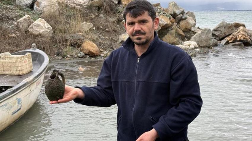 Bursalı balıkçının ağına takılan cisim şaşkına çevirdi! Duyan mahalleli oraya koştu
