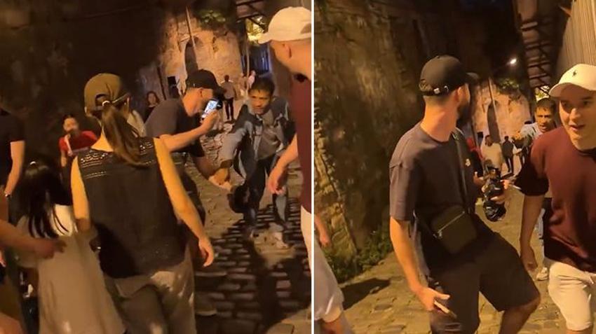 Galata'da 'fırça düşürme' numarası tutmadı! Rus turistler dolandırıcıyı fark etti