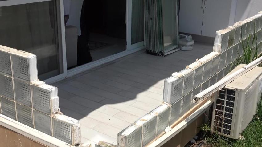 Bursa'da komşular 20 santimetrelik balkon çıkıntısı yüzünden mahkemelik oldular! Belediye yıkıma gelince ortalık savaş alanına döndü